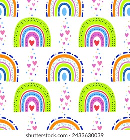 Seamless rainbow pattern. A rainbow in the sky and hearts. Design in bright colors for the children's room, textiles and fabrics