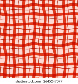 Seamless red checkered pattern with wavy lines on a soft pink background. Represents textile design, picnic cloth style, and retro geometric aesthetics