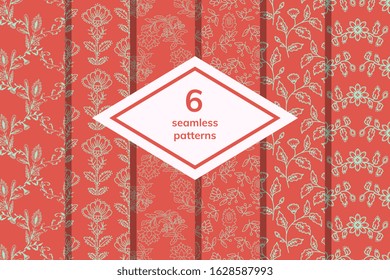 Seamless red floral patterns set