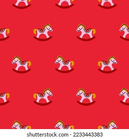 Seamless red pattern with rocking horses. Cute kids xmas background. Brigh colors child play illustration.