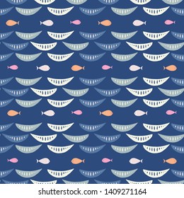 Seamless repeat of hand drawn small fish and waves on a dark blue background. Cute sea life vector pattern ideal for children.