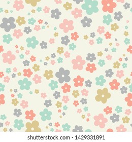 Seamless repeat of pastel stylized flowers in a tossed pattern. A pretty floral vector design background ideal for children and babies.