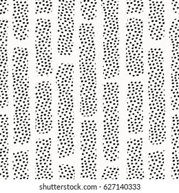 Seamless repeat pattern with abstract textured shapes in black on cream background. Modern style tiling background, gift wrap, fabric design.