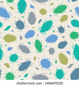 Seamless repeat pattern background of green and blue beetles and leaves. A vector silhouette design of bugs and foliage ideal for children.