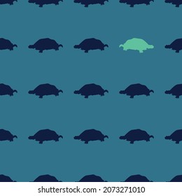 Seamless repeat pattern of blue and green abstract tortoise silhouettes in rows on a blue background. Great for fashion, textiles, surface textures, giftwrap, wallpaper.