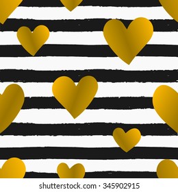 Seamless repeat pattern with gold foil hearts on black and white striped background. Tiling festive background, greeting card or wrapping paper.