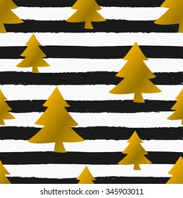 Seamless repeat pattern with gold foil Christmas trees on black and white striped background. Tiling festive background, greeting card or wrapping paper.