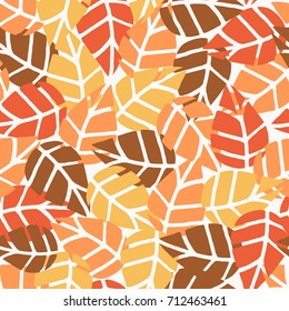 Seamless repeat pattern with leaves in red, orange, brown and yellow on white background. Nature inspired fabric, gift wrap, greeting card design.