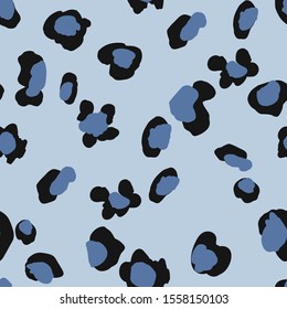 Seamless repeat pattern with loose hand drawn leopard cheetah wild cat spots in shades of blue