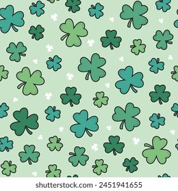 Seamless repeat pattern of St. Patrick's Day green and white clovers on a light green background.