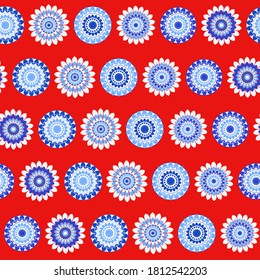 Seamless repeat pattern swatch. Geometric vector design of rosette flowers in red white and blue. Wallpaper, background, textile or paper print. 