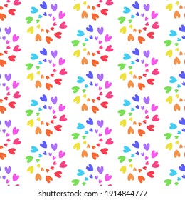 Seamless repeat pattern swatch. Vector design of cute rainbow hearts. Colour wheel flower effect. Valentines day, party invitations, cards, wrapping paper, background, wallpaper or textiles.  