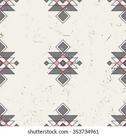 Seamless repeat pattern with tribal geometric elements in pink, gray and cream.