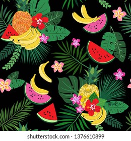 Seamless repeat pattern with tropical fruit, leaves and flowers on a black background