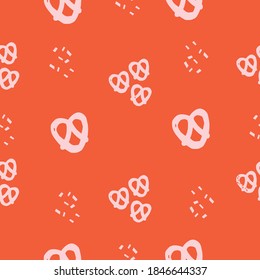 Seamless Repeat Pretzel Pattern with Pink Pretzels on a red background