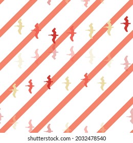 Seamless repeat vector pattern of bright colorful pelican silhouettes flying over orange and white diagonal stripes. Great for fashion, textiles, giftwrap, packaging, backgrounds.