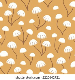 Seamless repeated surface vector pattern design with white hat mushrooms on a gold yellow background