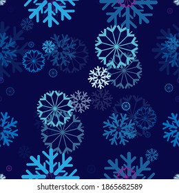 Seamless repeating background of different kinds of snowflakes