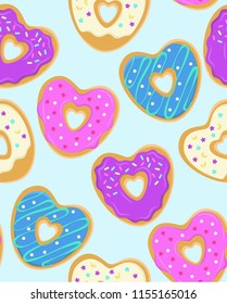 Seamless Repeating Heart Shaped Donut Pattern on a Blue Ground with Colorful Frosting and Festive Sprinkles.