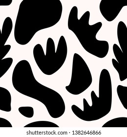 Seamless repeating pattern with abstract shapes and floral elements in black and white. Stylish and modern contemporary collage style poster, wallpaper, fabric, packaging and branding design.