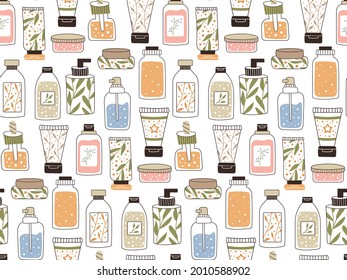 Seamless repeating pattern with cosmetics. A set of bottles and tubes, jars for skin care with face, hair and body cream. Fashion style for a postcard, banner, template for wrapping paper. Vector