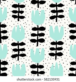 Seamless repeating pattern with geometric floral elements in black and mint green on dots background.