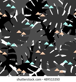 Seamless repeating pattern with gray tropical leaves and pink and blue triangles. Retro style tiling background, poster, wrapping paper, textile, greeting card design.