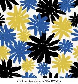 Seamless repeating pattern with hand painted flowers in black, blue and yellow.