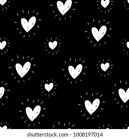 Seamless repeating pattern with handwritten white hearts on Valentine's Day. Pattern for textiles, poster, wrapping paper