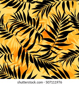 Seamless repeating pattern with silhouettes of palm tree leaves on background. 