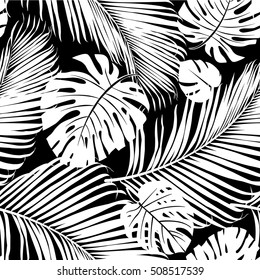 Seamless Repeating Pattern With Silhouettes Of Palm Tree Leaves In Black On White Background.