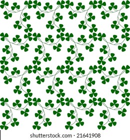 Seamless repeating pattern of small green Irish shamrocks for Saint Patrick's Day background or wallpaper.  Vector illustration.