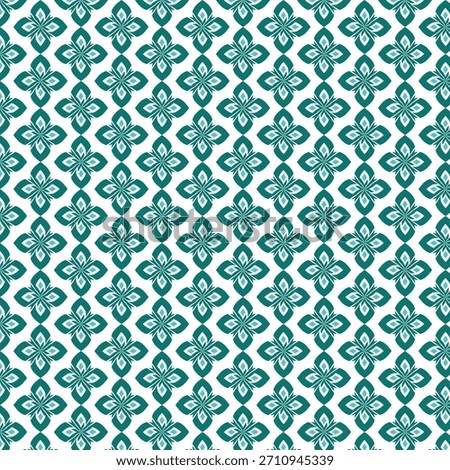 A seamless repeating pattern of teal quatrefoil shapes with floral accents on a white background. This design evokes a sense of traditional artistry and modern elegance.