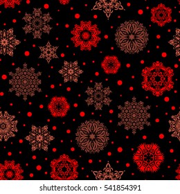 Seamless Repeating Pattern. Vector design. Christmas Stylized red, orange and brown Snowflakes on a Black Background.