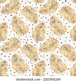 Seamless repeating pattern with yellow tropical leaves on white slub fabric textured background. Good for paper, poster, textile, greeting card design.
