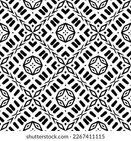 Seamless repeating pattern.Black and 
white pattern  for decor, textile ,fabric,wallpapers and backgrounds.