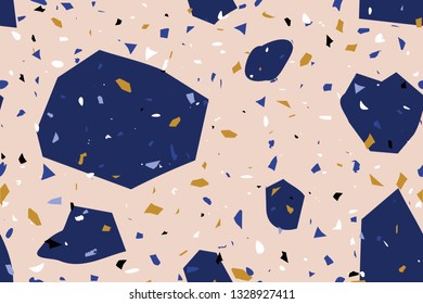 Seamless repeating terrazzo pattern in blue, yellow, black and white on pastel pink background. Trendy and stylish composite stone texture, wallpaper, web background, fabric design.