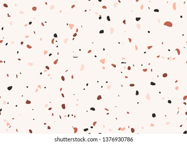 Seamless repeating terrazzo pattern in pastel pink, brown and black on white background. Trendy and stylish composite stone texture, wallpaper, web background, fabric design.