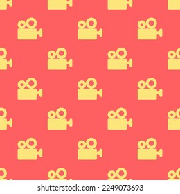Seamless repeating tiling cinema  flat icon pattern of pastel red and mellow yellow color. Background for letter.