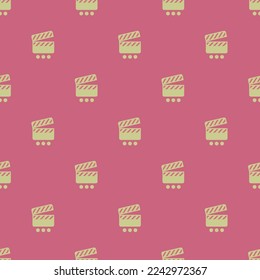 Seamless repeating tiling movie clapper select flat icon pattern of blush and medium spring bud color. Background for slides.