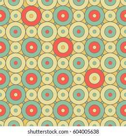 Seamless retro pattern of colored abstract circles.