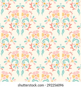Seamless retro pattern of different colored summer flowers on a pastel background. Perfect use for textile, paper manufacturing, backgrounds, etc. Fully editable vector illustration