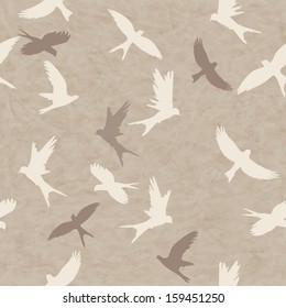 Seamless retro pattern with silhouettes of colorful birds
