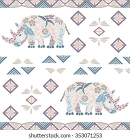 Seamless rhino pattern made from flowers, leaves in the ethnic style. Animal print. Arabic, indian, african, asian motive for background, wallpaper, pattern fills, wrapping paper, fabric, etc. Vector 