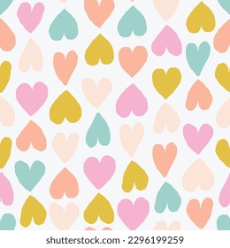 Seamless romantic pattern with coloured hearts. Seamless hearted texture. Valentine's Day background