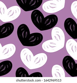 Seamless romantic pattern with hearts. Colorful doodle hearts on a purple background. Ready template for design, greeting card, print, poster, party, vintage textile. Vector.