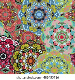 Seamless round ornament pattern for printing on fabric or paper. Hand drawn background. Elements for your design.

