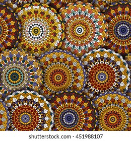 Seamless round pattern for printing on fabric or paper. Hand drawn background. Colored indian ornament. Vector illustration. Elements for your design. Brown blue orange.