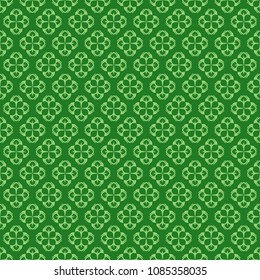 Seamless sample from the repeating abstract patterns against a green background. Asian style. Japanese symbol. Endless texture for textile design. Vector color background.