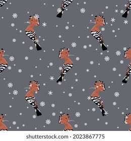 Patrón de invierno animal de temporada sin foco con aves de la hoopoe y copos de nieve. Upupa se hace. Sobre fondo gris.